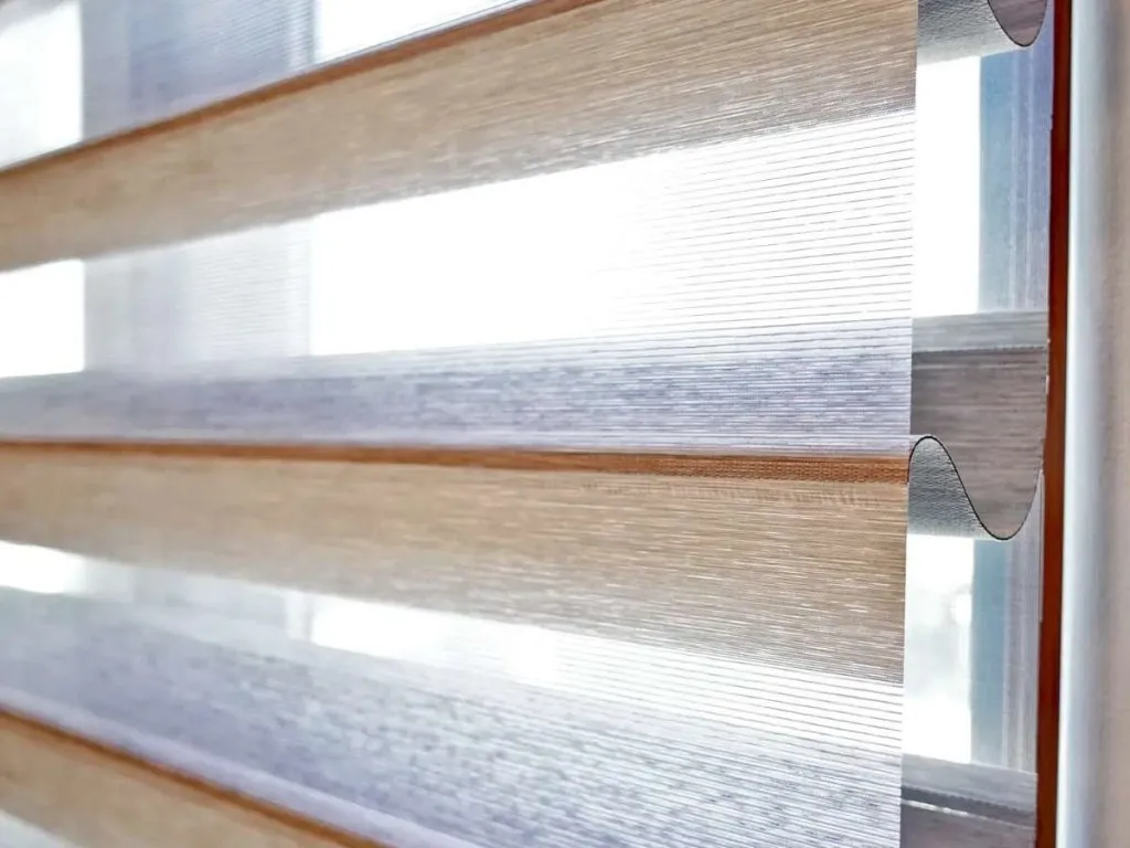 Designer banded shade detail showing the fabric edge and layered construction